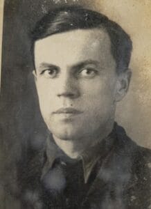 young man in old black and white photo