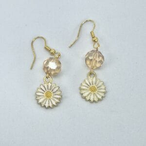 Daisy themed earrings with faceted bead
