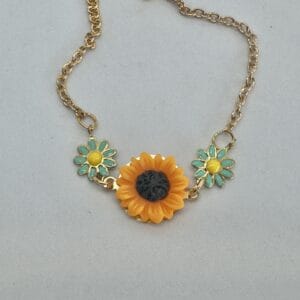 Necklace Featuring a Floral Design Sunflower and Daisies