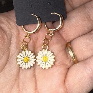 Golden enamelled daisy earrings