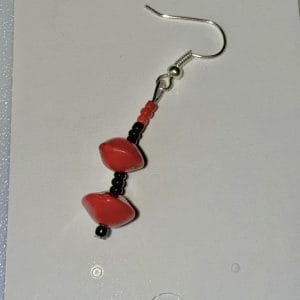 Red sandalwood seed and black glass earrings