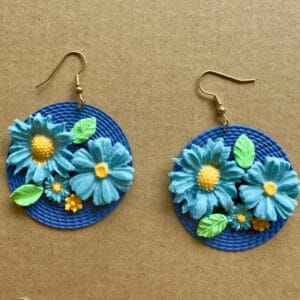 Blue disc earrings with flowers