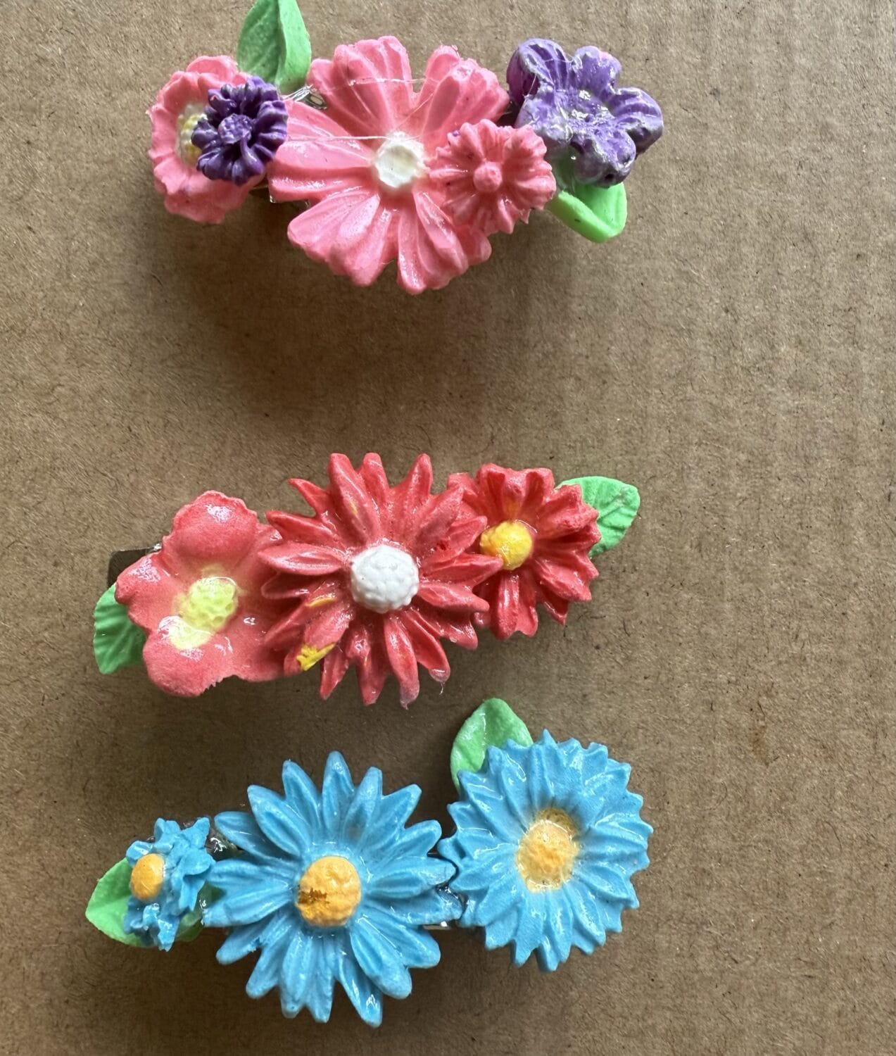three colourful flower hairclips