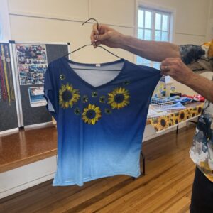 #SupportUkraine Handpainted Sunflowers on royal blue ombre T-shirt. Size 16-18.