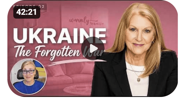 a lady with a background that says Ukraine the forgotten war